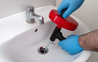 furet pour déboucher un lavabo